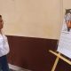 Personas visitan la exposición Rompiendo el silencio: retratos de sobrevivientes en la ciudad de Tapachula en el estado de Chiapas (México). EFE/Juan Manuel Blanco