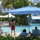 Unas personas disfrutan en una piscina en el hotel Marriott Courtyard en Isla Verde, Puerto Rico. Fotografía de archivo. EFE/Jorge Muñiz