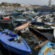 Foto de archivo de decenas de pateras usadas por los inmigrantes para cruzar el Mediterráneo que se acumulan en el puerto de la isla italiana de Lampedusa. EFE/ Gonzalo Sánchez