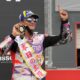 El piloto español Jorge Martín celebra en el podio tras sumar su tercera victoria de la temporada al vencer un Gran Premio de Japón de MotoGP en el circuito "Mobility Resort" de Motegi (Japón). EFE/ Kimimasa Mayama