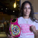 La boxeadora puertorriqueña Amanda Serrano posa con su cinturón de campeona durante una entrevista con EFE el 5 de enero de 2024, en San Juan (Puerto Rico). EFE/ Thais Llorca