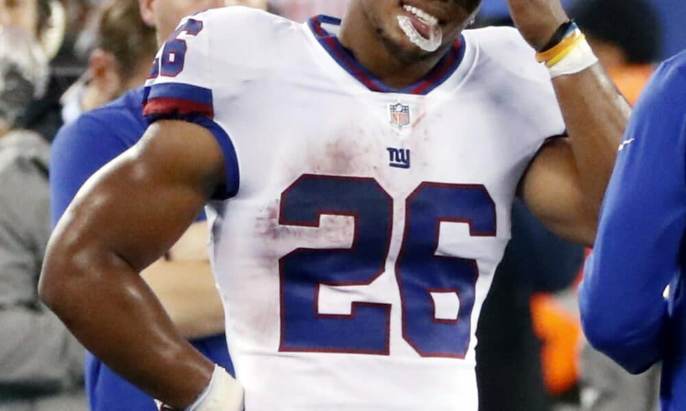 Fotografía de archivo del excorredor de los New York Giants, Saquon Barkley. EFE/Jason Szenes