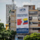 Fotografía de una valla publicitaria de una empresa de carga que presta servicios logísticos entre China y Venezuela. EFE/ Rayner Peña R.