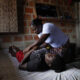 Fotografía de María Crucelina Sánchez (d), 'Chilina', mientras atiende a una joven embarazada en la población de Iró (Colombia). EFE/ Mauricio Dueñas Castañeda
