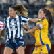 Marie Burkenroad (i) de Monterrey disputa el balón con Cristina Ferral de Tigres. Imagen de archivo. EFE/ Miguel Sierra