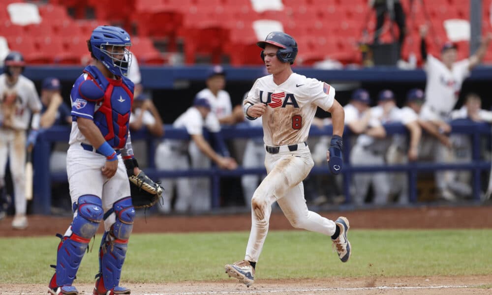 Gavin Fien, de Estados Unidos, fue registrado este sábado, 10 de agosto, al anotarle una carrera de Puerto Rico, durante un partido del Premundial U18 de béisbol, en el estadio Nacional Rod Carew, en Ciudad de Panamá (Panamá). EFE/Bienvenido Velasco