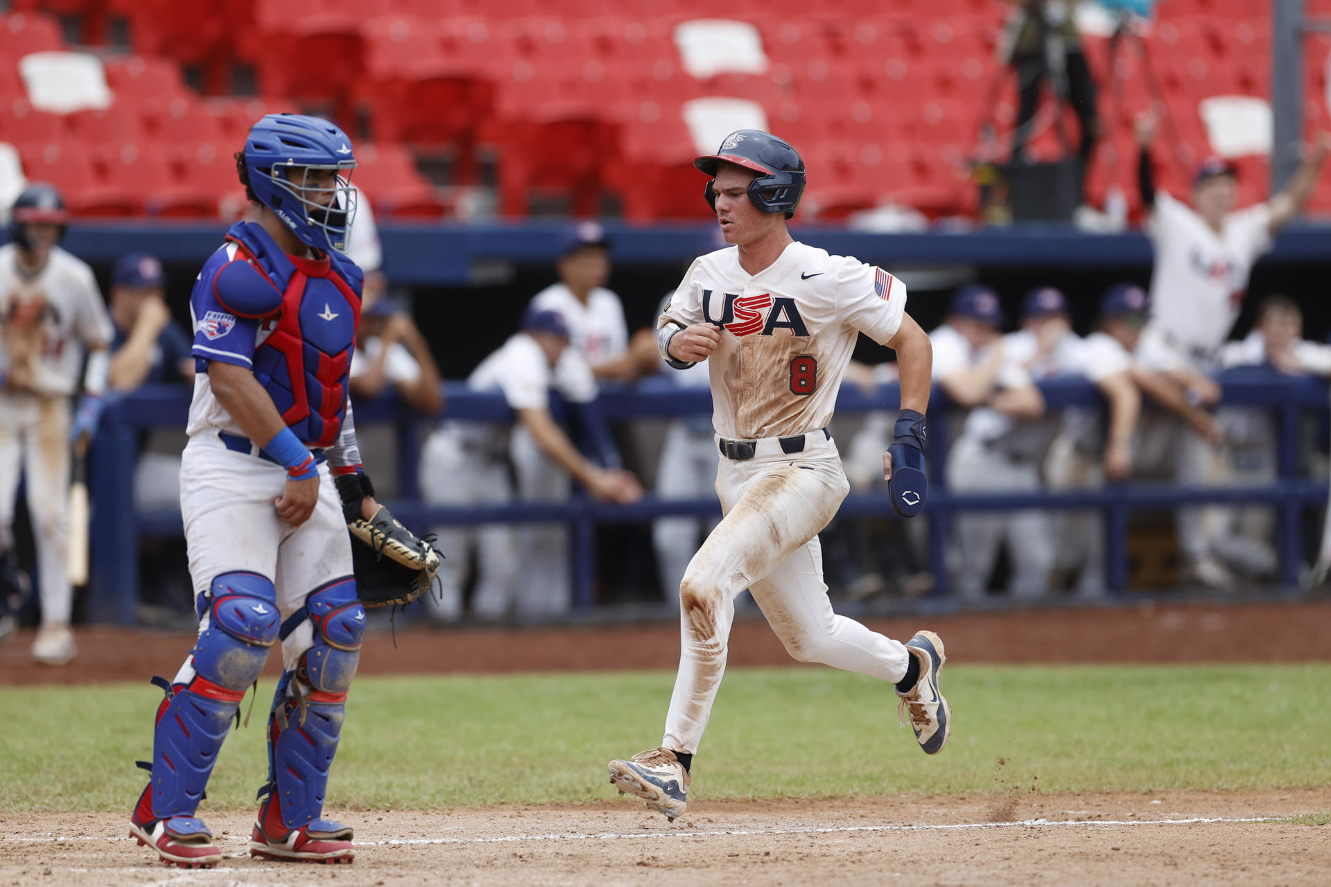 Gavin Fien, de Estados Unidos, fue registrado este sábado, 10 de agosto, al anotarle una carrera de Puerto Rico, durante un partido del Premundial U18 de béisbol, en el estadio Nacional Rod Carew, en Ciudad de Panamá (Panamá). EFE/Bienvenido Velasco