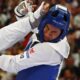 El mexicano Carlos Sansores (azul) ante la irané Arian Salimi en el Grand Palais en Paris, Francia. EFE/EPA/DIVYAKANT SOLANKI