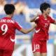 Jon Ryong Jong (d) de Corea celebra en un partido del grupo F de la Copa Mundial Femenina sub-20. EFE/ Ernesto Guzmán Jr.