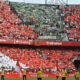 Detalle de la grada de aficionados del Real Betis rodeados de aficionados del Sevilla durante el partido de la novena jornada de Liga disputado entre el Sevilla FC y el Real Betis esta tarde en el estadio Ramón Sánchez-Pizjuán de Sevilla. EFE/Raúl Caro