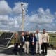 Fotografía cedida por el Aeropuerto Internacional de Miami (MIA) donde aparecen (de izquierda a derecha) la gerente de seguridad del aeropuerto, Susan Feeney; la gerente de construcción, Leslie Livesay; el director de Capacidades Multimodales y de Área Pública (MPAC) de la Administración de Seguridad del Transporte (TSA), Jim Bamberger; la alcaldesa del condado Miami-Dade, Daniella Levine Cava; el director y presidente ejecutivo del aeropuerto, Ralph Cutié, y el director adjunto de seguridad pública y protección, Mark Hatfield, mientras posan cerca de una cámara con Sistema de Detección de Intrusiones Perimetrales (PIDS) en el aeropuerto en Miami, Florida (EE.UU). EFE/MIA