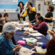 Integrantes de la organización civil Centro 32 participan con migrantes en talleres de costura este viernes en la ciudad de Tijuana, Baja California (México). EFE/Joebeth Terríquez