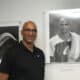 Fotografía cedida por The Jai-Alai Network del exjugador de Jai-Alai, Benjamin 'Benny' Bueno, posando junto a un retrato suyo exhibido durante la inauguración de la exposición '100 años de Jai Alai en Miami' el 29 de agosto de 2024,en Miami, Florida (EE. UU). EFE/The Jai-Alai Network /SOLO USO EDITORIAL /NO VENTAS /SOLO DISPONIBLE PARA ILUSTRAR LA NOTICIA QUE ACOMPAÑA /CRÉDITO OBLIGATORIO