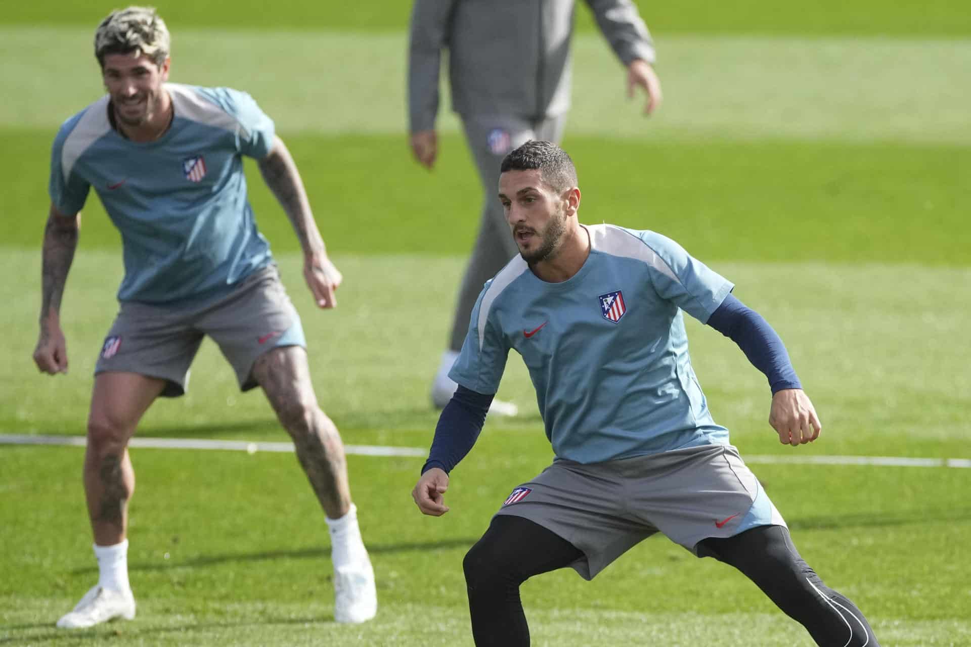 Koke y De Paul, durante el entrenamiento de este miércoles.-EFE/ Borja Sanchez-Trillo