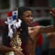 Un peregrino baila en su camino a la iglesia de San Felipe para rendir devoción al 'Cristo Negro de Portobelo' este 21 de octubre de 2024, en Portobelo (Panamá). EFE/Bienvenido Velasco