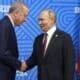 Russian President Vladimir Putin (R) welcomes Turkish President Recep Tayyip Erdogan before their meeting on the sidelines of the BRICS summit in Kazan, Russia, 23 October 2024. The BRICS summit takes place from 22 to 24 October. (Rusia) EFE/EPA/ALEXANDER ZEMLIANICHENKO / POOL