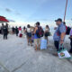 Turistas son evacuados por autoridades de la isla de Holbox ante la llegada del huracán Milton, este lunes en Quintana Roo (México). EFE/Alonso Cupul