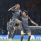 El delantero del Real Madrid Kylian Mbappé (i) celebra su gol ante el Celta con Fran García, durante el partido de la décima jornada de LaLiga EA Sports en el estadio de Balaídos. EFE/Lavandeira