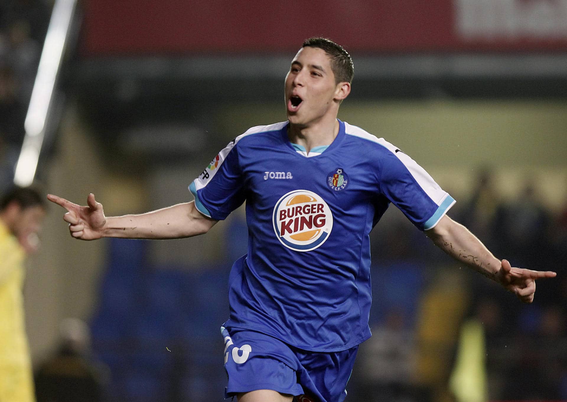 El centrocampista francés del Getafe, Abdelaziz Barrada, celebra un gol en un partido de liga el 12/03/2012. EFE/Domenech Castelló.