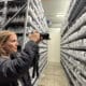 Una mujer le toma fotografías a semillas conservadas producto de una investigación de la Alianza de Bioversity International y el CIAT, en Palmira (Colombia). EFE/ Mario Baos