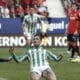 El delantero argentino del Betis Chimy Ávila celebra tras anotar durante el encuentro correspondiente a la décima jornada de LaLiga entre el Osasuna y el Betis en El Sadar, Pamplona, Navarra, este sábado. EFE/ Jesús Diges