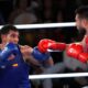 Combate de boxeo olímpico, en París 2024, entre el uzbeko Bakhodir Jalolov of Uzbekistan (rojo) y el español Ayoub Ghadfa Drissi El Aissaoui (azul), en una foto de archivo. EFE/EPA/YAHYA ARHAB