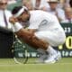 Rafael Nadal se duele de un tobillo durante su partido de cuarta ronda del torneo de tenis de Wimbledon contra el argentino Juan Martín Del Potro jugado en el All England Lawn Tennis Club de Londres, el 27 de junio de 2011. EFE/FELIPE TRUEBA