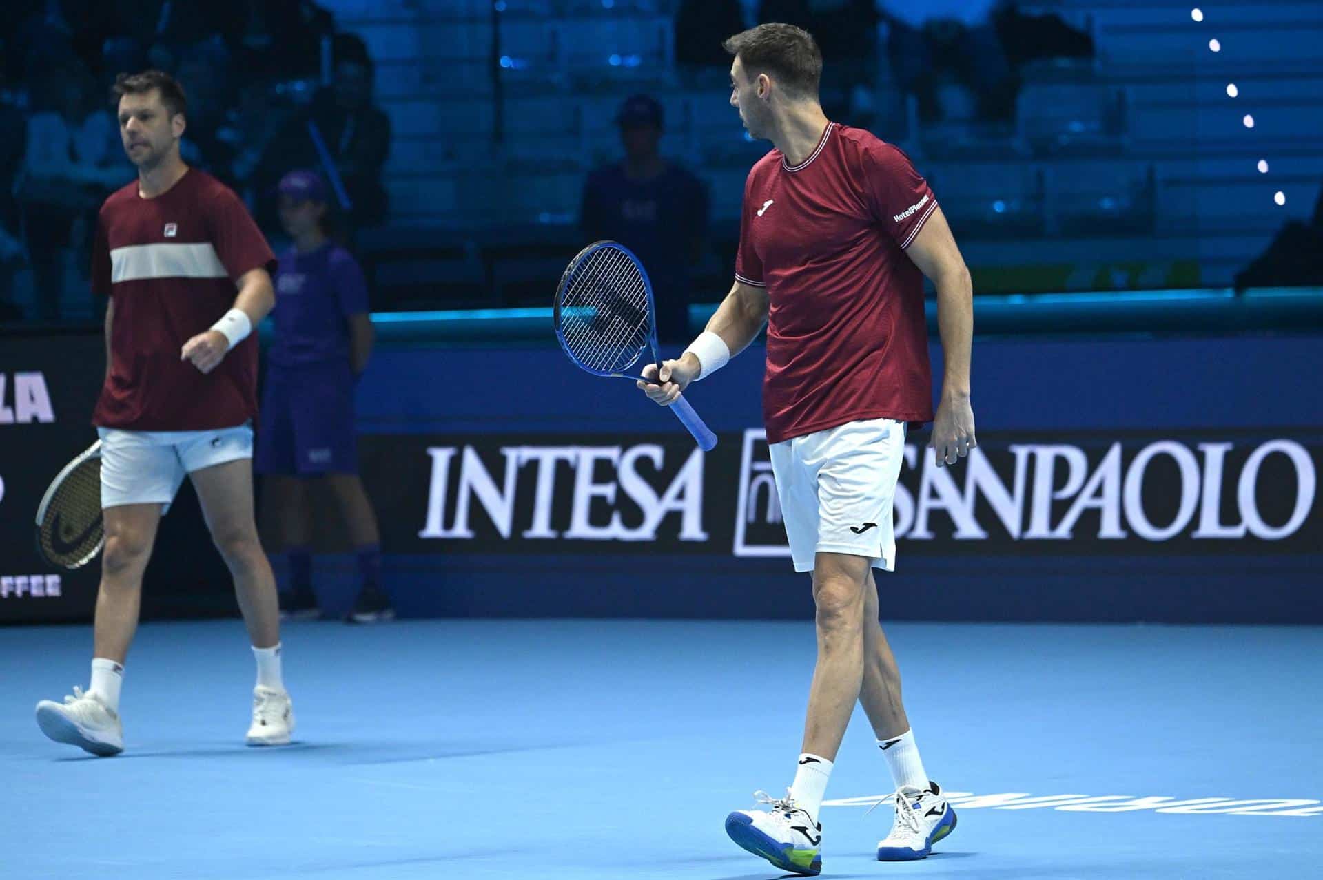 Los tenistas Marcel Granollers, de España, y Horacio Zeballos, de argentina, durante el partido d dobles de las Nitto ATP Finals en Turín, Italia. EFE/EPA/MASSIMO RANA