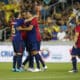 Jugadores de Barcelona celebran un gol en un partido amistoso en el estadio Liga Arena entre Barcelona y Pelé Pequeño Príncipe en Curitiba (Brasil). EFE/ Hedeson Alves