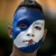 Fotografía de archivo en donde se ve un joven con la cara pintada con los colores de la bandera de Nicaragua. EFE/ Jorge Torres