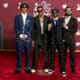 Los integrantes de la banda venezolana Rawayana, posan en la alfombra roja de la 25 entrega anual de los Premios Latin Grammy, en el Kaseya Center de Miami, Florida (Estados Unidos). EFE/ Eva Marie Uzcátegui