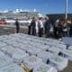 La Policía Nacional y la Armada han interceptado a 900 kilómetros al noroeste de Canarias un pesquero panameño cargado con 4.500 kilos de cocaína que, presuntamente, se iba a ser desembarca en las Rías Baixas, en Galicia. En la imagen, los fardos incautados a su llegada junto con los detenidos a la Base Naval de Las Palmas de Gran Canaria. EFE/Ángel Medina G.