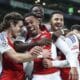 Los jugadores del Arsenal celebran el gol de Gabriel Magalhaes (2- I) durante el partido de la quinta jornada de la UEFA Champions League que han jugado en el Alvalade stadium, en Lisboa, Portugal. EFE/EPA/MIGUEL A. LOPES