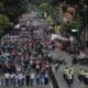 Integrantes de la Juventud Comunista de Venezuela (JCV) participan en una manifestación en conmemoración del día del Estudiante Universitario este jueves, en Caracas (Venezuela). EFE/ Miguel Gutiérrez