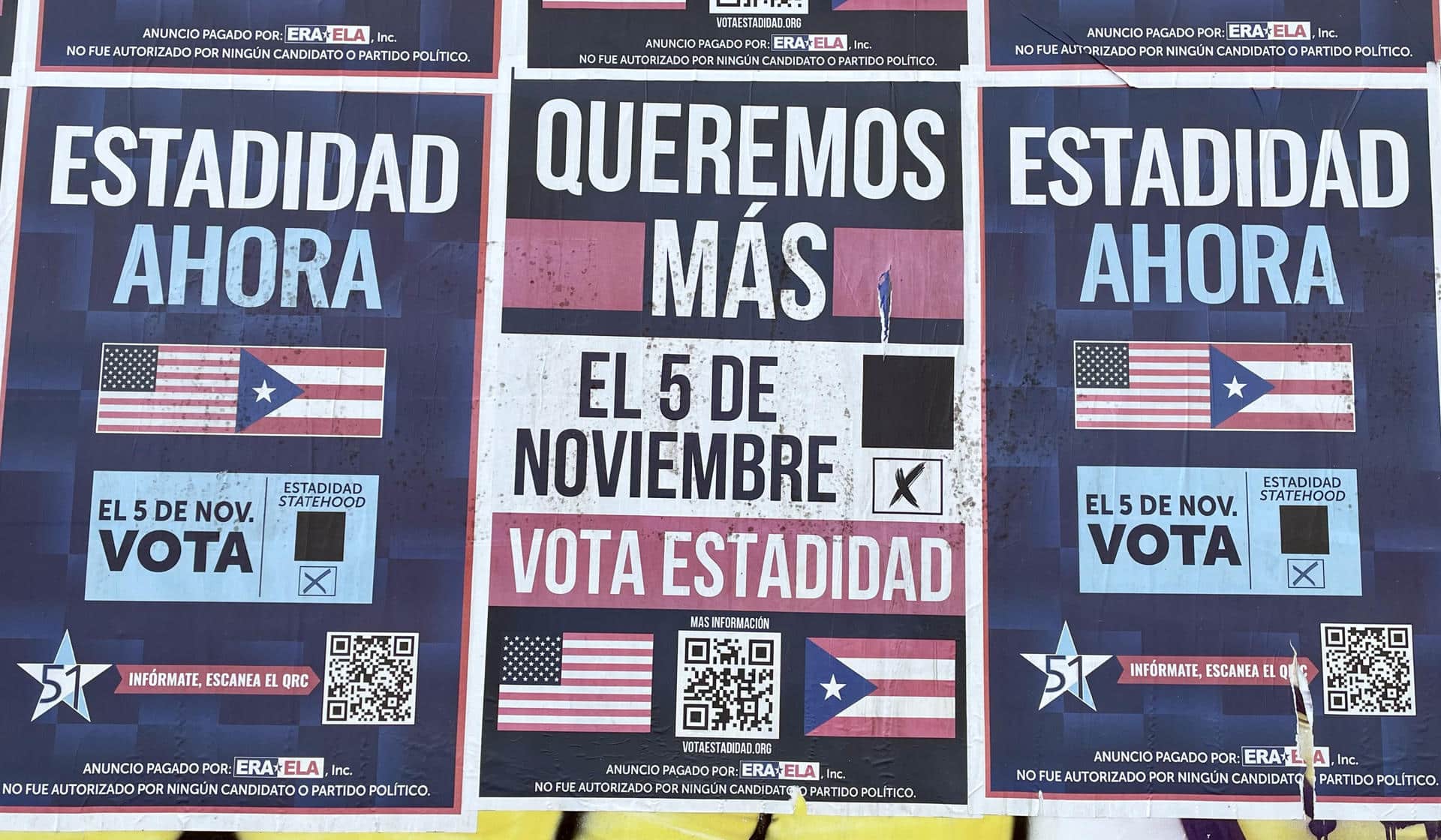 Fotografía del 22 de octubre de 2024 de carteles que piden votar a favor de la estadidad de Puerto Rico, en una calle de San Juan (Puerto Rico). EFE/ Marina Villén