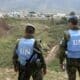 - Cascos azules españoles desplegados en Líbano comenzaron hoy a levantar una alambrada de espino en el sur de Líbano para cerrar un paso de trescientos metros entre Líbano e Israel utilizado por contrabandistas. En la foto, dos soldados españoles observan los trabajos que realizan decenas de militares españoles apoyados por máquinas excavadoras y en presencia de soldados libaneses y algunos cascos azules franceses, para colocar la valla en el límite de la localidad meridional de Ghayar, ocupada por Israel desde la guerra del verano de 2006. EFE/Ronith Daher