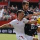 Fotografía de archivo del defensa del Sevilla Adrià Pedrosa y del centrocampista ruso de la Real Sociedad Arsen Zakharyan, durante un partido entre el Sevilla y la Real Sociedad. EFE/José Manuel Vidal