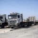 Fotografía de archivo en donde se observa camiones estacionados en Rafah, sur de la Franja de Gaza. EFE/ Haitham Imad