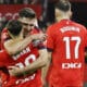 Los jugadores de Osasuna celebran el gol ante el Sevilla, durante el partido de LaLiga que Sevilla FC y CA Osasuna disputan este lunes en el estadio Ramón Sánchez-Pizjuán. EFE/José Manuel Vidal