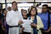 Quezon City (Philippines), 02/12/2024.- Member of the House of Representatives Perci Cendana (L front) and former Philippine senator Leila De Lima (C front) hold a copy of an impeachment complaint against Philippine Vice-President Sara Duterte (not pictured), before officially filing it at the House of Representatives in Quezon City, Metro Manila, Philippines, 02 December 2024. The complaint, filed by members of various human rights advocacy groups and endorsed by Cendana, cites multiple allegations of grave misconduct and constitutional violations. (Filipinas) EFE/EPA/ROLEX DELA PENA
