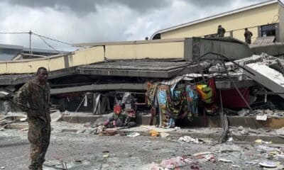 Port Vila (Vanuatu), 17/12/2024.- A handout photo made available by Michael Thomson shows video screengrab of a soldier standing beside a collapsed building following an earthquake in Port Vila, Vanuatu, 17 December 2024. A 7.3 magnitude earthquake struck the waters of the Vanuatu archipelago in the South Pacific on 17 December, causing material damage to buildings in the capital, Port Vila, including the US Embassy. (Terremoto/sismo) EFE/EPA/MICHAEL THOMSON HANDOUT HANDOUT EDITORIAL USE ONLY/NO SALES