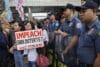 Quezon City (Philippines), 04/12/2024.- Protesters hold a rally calling for the impeachment of Philippine Vice-President Sara Duterte (not pictured), as police look on outside the House of Representatives (HOR) in Quezon City, Metro Manila, Philippines, 04 December 2024. A second impeachment complaint against Duterte was filed on 04 December at the HOR by members of multi-sectoral groups, citing betrayal of public trust as an offense manifested by misuse of funds by the Office of the Vice-President and by the office she previously held in the Department of Education. (Protestas, Filipinas) EFE/EPA/ROLEX DELA PENA
