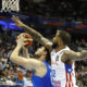 El italiano Danilo Gallinari (i) entra a canasta ante on Christopher Ortiz, de Puerto Rico, durante el Torneo de Clasificación Olímpica FIBA disputado en julio en San José (Costa Rica). EFE/ Thais Llorca