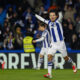 El centrocampista japonés de la Real Sociedad Takefusa Kubo celebra su gol durante el encuentro correspondiente a la jornada 19 de LaLiga EA Sports que Real Sociedad y Villarreal disputan hoy lunes en el estadio de Anoeta, en San Sebastián. EFE / Juan Herrero.