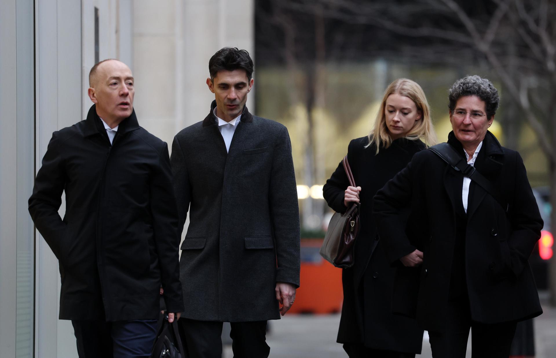 El equipo legal de NGN. EFE/EPA/ANDY RAIN