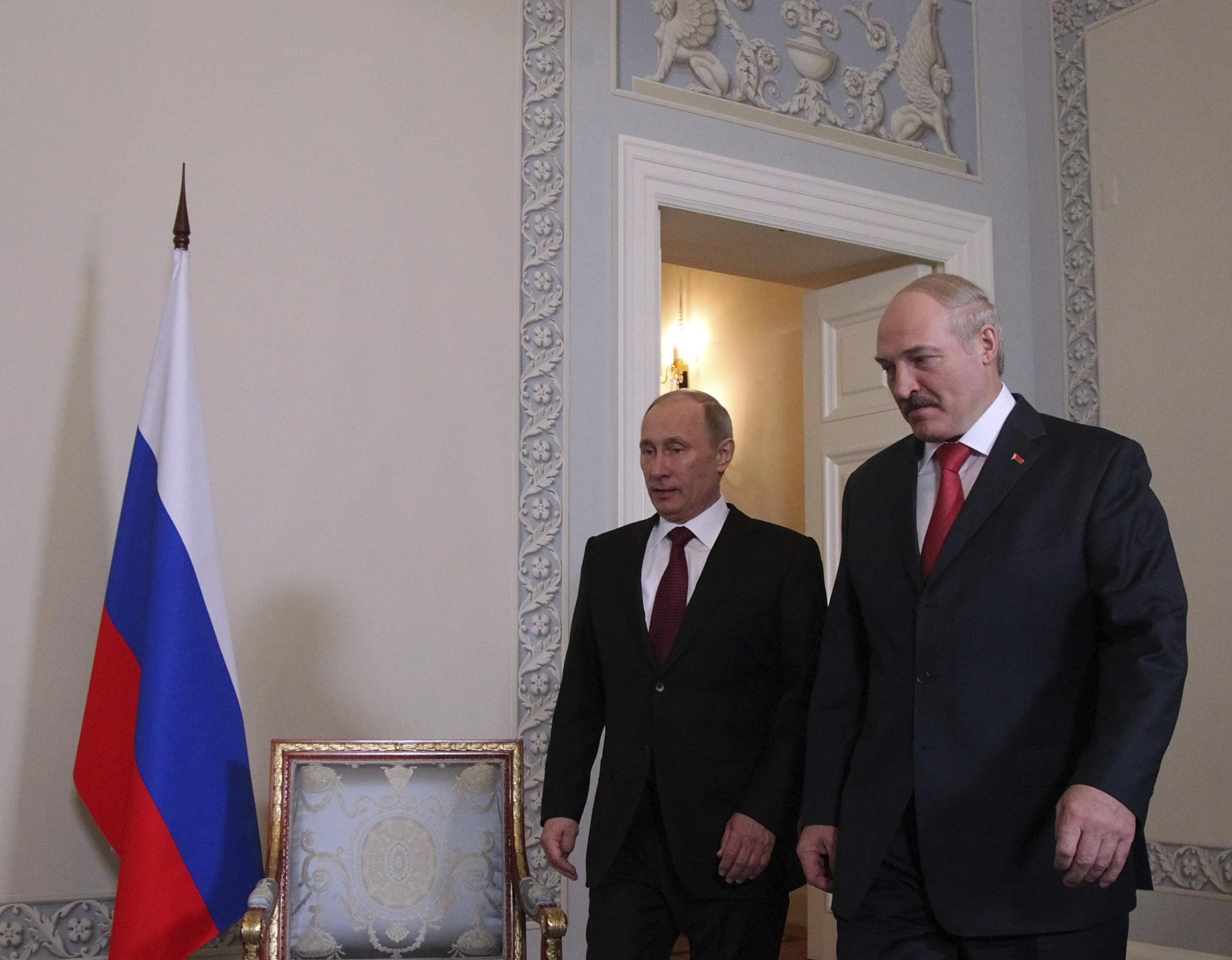 Imagen de archivo de los presidentes ruso, Vladimir Putin, y bielorruso, Alexander Lukashenko. EPA/ANATOLY MALTSEV