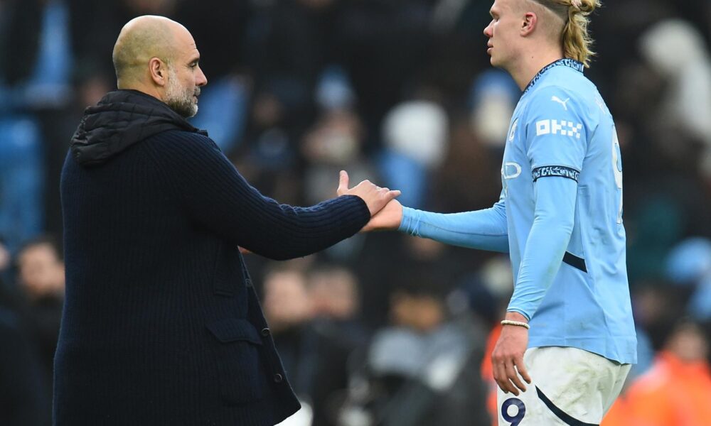 El entrenador del Manchester City Pep Guardiola y Erling Haaland. EFE/EPA/PETER POWELL