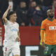 El defensa del Sevilla Adrià Pedrosa (i) celebra su gol durante el partido de la jornada 19 de LaLiga que Sevilla FC y Valencia CF disputaron en el Ramón Sánchez-Pizjuán, en Sevilla. EFE/Julio Muñoz