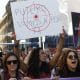 MADRID (ESPAÑA), 11/10/2025.- Vista de la manifestación convocada por el Movimiento Feminista de Madrid (MFM) con el lema 'Ley abolicionista, ya', para exigir al Gobierno y a los grupos políticos la aprobación de la ley abolicionista de la prostitución este sábado en la Plaza del Callao en Madrid. EFE/ Chema Moya