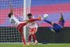 El delantero del FC Barcelona Lamine Yamal (d) remata a portería durante el partido de la jornada 9 de LaLiga EA Sports, entre el FC Barcelona y el Girona FC, en el estadio Olímpico de Montjuic, en Barcelona. EFE/ Alejandro García